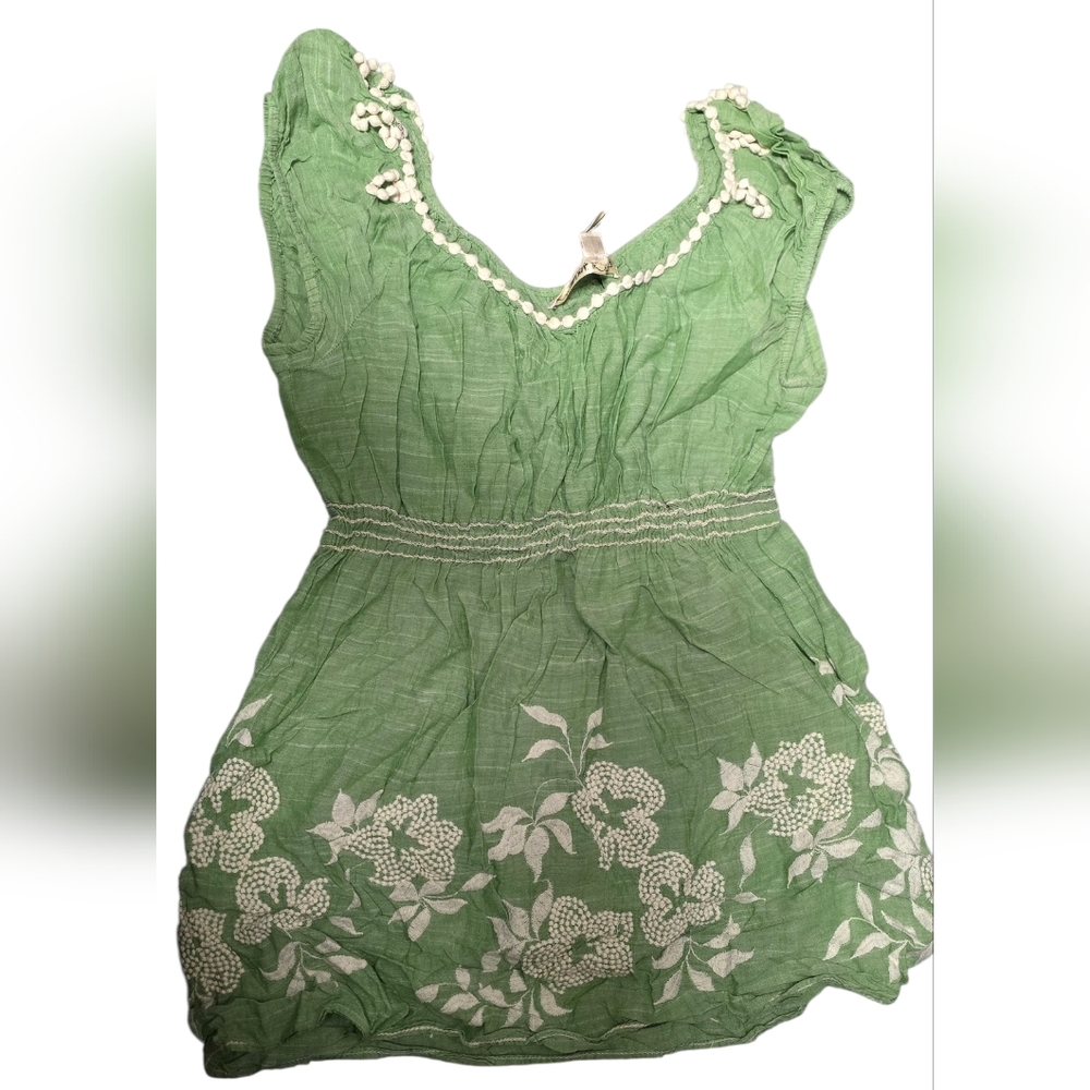 Green Dress and White Floral Design